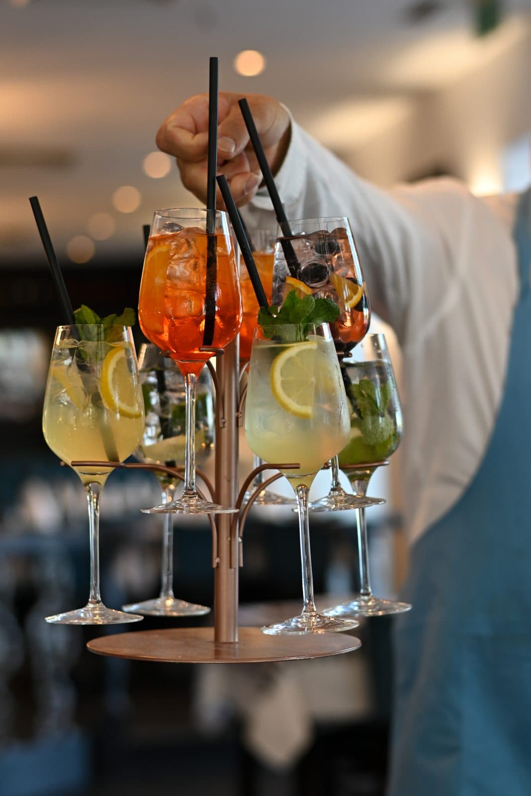 A tier of spritz and cocktails, served